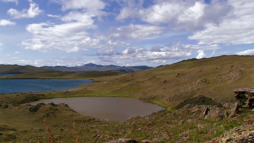 HD. Two landscapes with time lapse clouds