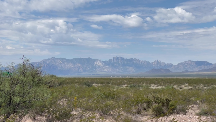 Scenic distant Organ Mountains vista under dramatic monsoonal sky, south east New Mexico