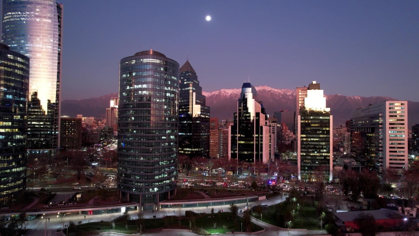 Sunset landscape at Santiago Chile. Towers offices buildings at Santiago Chile. Cityscape of urban scenery. Colorful sunset at downtown of Santiago Chile. Modern tower offices. Dusk sky. Evening sky. Royalty-Free Stock Footage #1093326989
