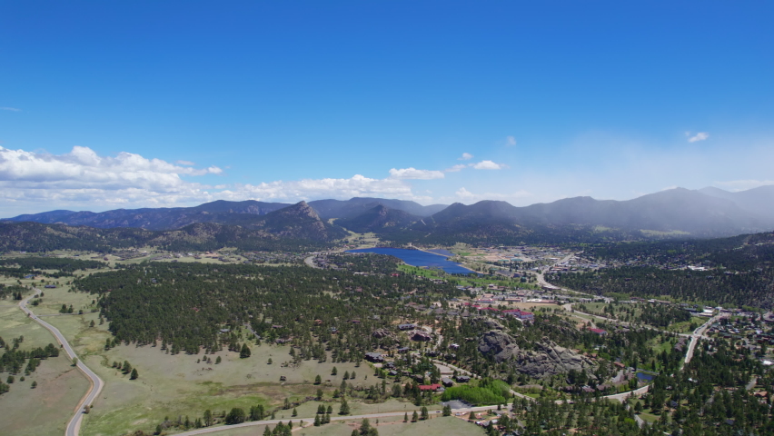 Estes Park Colorado USA. Scenic HD Aerial Drone Footage Of Small Town Surrounded By Beautiful Mountains And Alpine Forest.