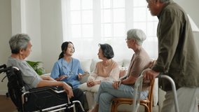 Group of asian senior people listening to young nurse.Psychological support group for elderly therapy session in a community centre. Group therapy in session sitting in a circle in a nursing home. - Powered by Shutterstock - Get 15% off with code: PIKWIZARD15
