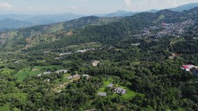 4K Video Aerial shot house in green mountain in Northern of thailand