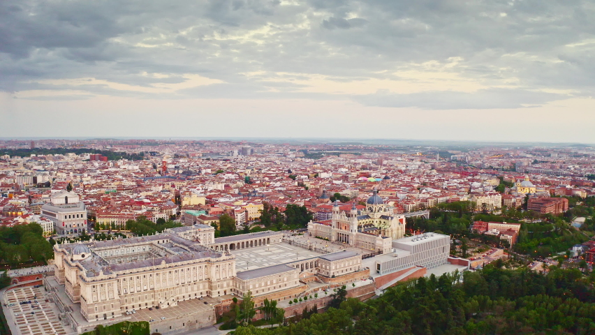 Aerial view popular tourist destination capital city of Spain Madrid large historic Royal Palace complex famous buildings and official residence of Spanish royal family main attraction for travelers