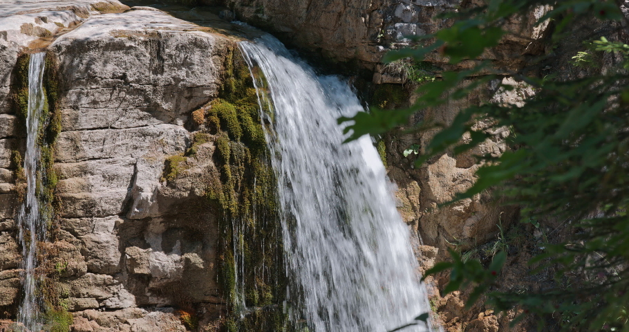 Farchant, Germany - 14 August, 2022: Falling water on a sunny day in Bavaria