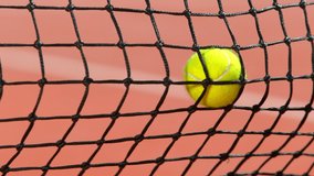 Super Slow Motion Shot of Tennis Ball Hitting the Net on Court at 1000fps. - Powered by Shutterstock - Get 15% off with code: PIKWIZARD15
