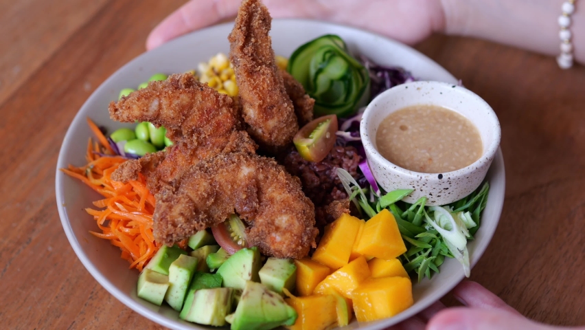 Deep fried vegan tiger prawn served with sauce and various vegetables. Delicious and healthy seafood, low in fat is great for a diet. Food meal deep fried breaded. Vegan food