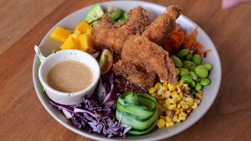 Deep fried vegan tiger prawn served with sauce and various vegetables. Delicious and healthy seafood, low in fat is great for a diet. Food meal deep fried breaded. Vegan food