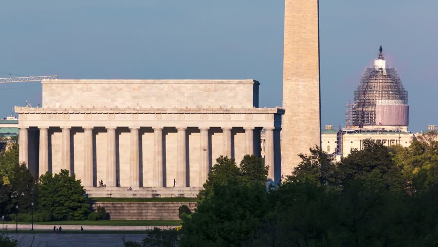 Time-lapse of the Lincoln Memorial, Washington Monument, and the Capitol Building - the Big Three - at sunset.