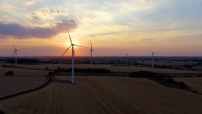 The wind turbine is not spinning. Energy producing wind turbines. Wind turbines with blades in field aerial view. Broken windmill Royalty-Free Stock Footage #1093368691