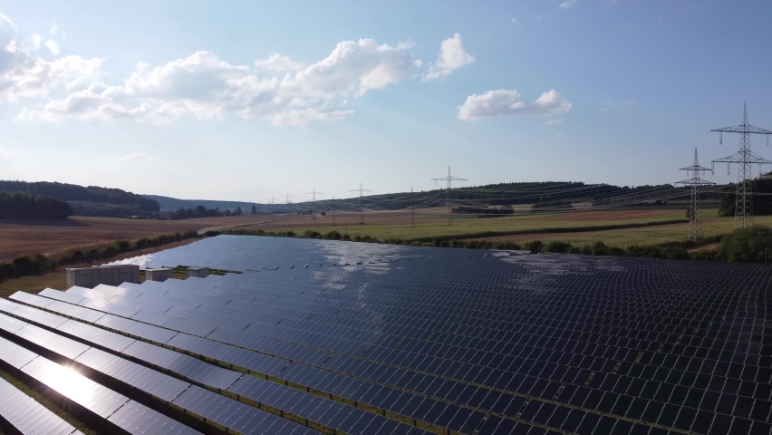 Solar park on the swabian alps near city Suppingen - Aearial View, a Technology Video by Juergen Faelchle
