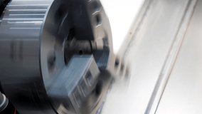 Rotating Metal machine with drum. Rotating round part in production machine. Metal drum or parts rotate at factory - Powered by Shutterstock - Get 15% off with code: PIKWIZARD15