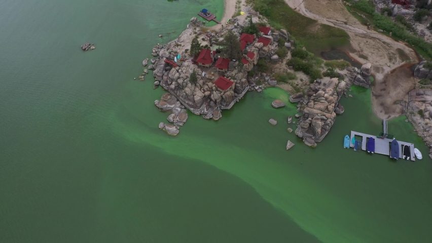 Aerial view over Big Bear lake in California, during a green algae outbreak. 
