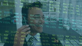 Stock market data processing against caucasian businessman using smartphone at office. computer interface and business technology concept - Powered by Shutterstock - Get 15% off with code: PIKWIZARD15