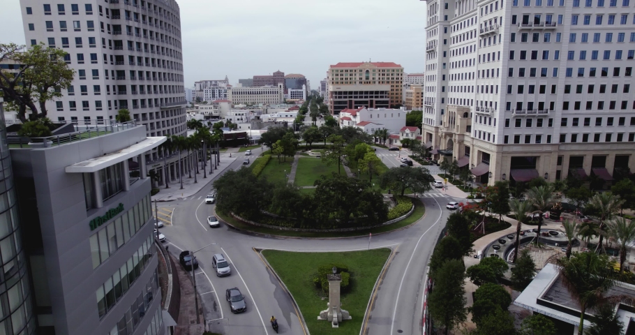 Aerial view low over the Ponce Circle Park, in cloudy Coral Gables, Miami, USA