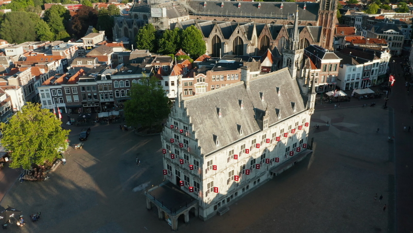 Exterior Facade And Roof Of Town Hall On Market Square In Gouda, South Holland, Netherlands - aerial drone shot