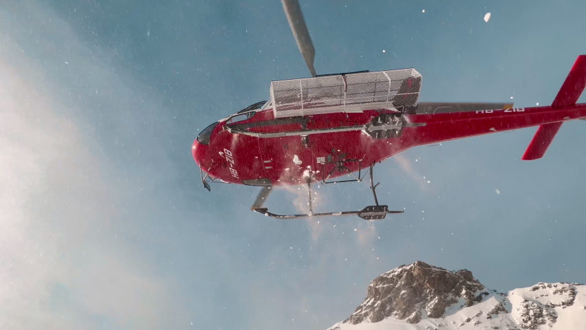 Snowboarding in alps. Rescue helicopter Royalty-Free Stock Footage #1093410545