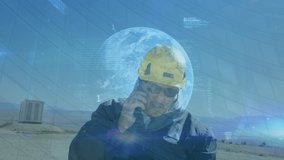 Animation of financial data and globe over wind turbine. Eco power, green energy, global finance and economy concept digitally generated video. - Powered by Shutterstock - Get 15% off with code: PIKWIZARD15