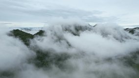 High drone view of fog in rainy season over mountain for create nature video scene. 4k shooting 