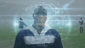 Animation of globe of connections over african american rugby player at stadium. Global sport and digital interface concept digitally generated video. - Powered by Shutterstock - Get 15% off with code: PIKWIZARD15