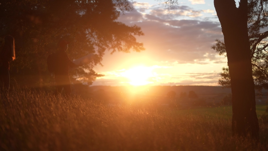 hiker group. team of hikers with backpacks silhouette walk through the forest. nature travel a adventure concept. hiker group lifestyle with backpacks walk on the sunset. mountain outdoor view