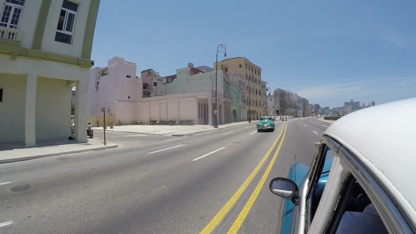 Driving in the famous Malecon Avenue, Havana, Cuba