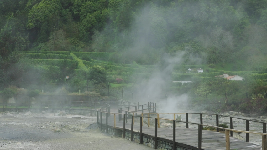 Active volcanic hot springs with steam above them. Azores, Portugal.