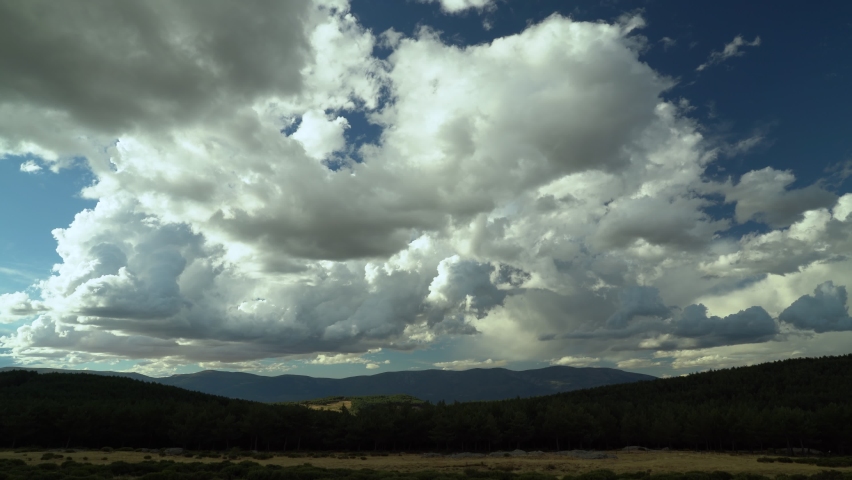 (TIME LAPSE) panoramic view of the Sierra de Madrid with storm clouds. Madrid, Spain, August 19, 2022.
