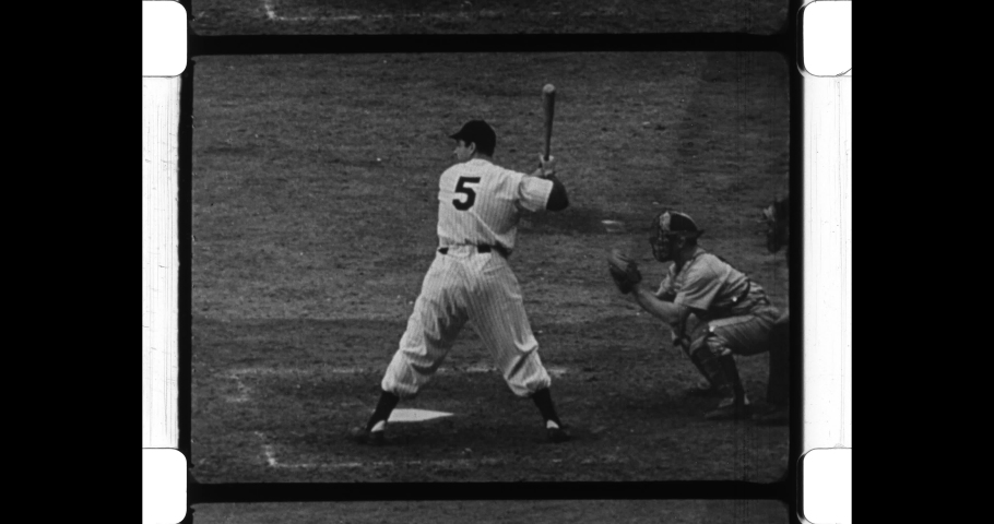 1947 New York City. New York Yankee Joe DiMaggio hits baseball into left field, but Brooklyn Dodgers outfielder Al Gionfriddo catches ball in 1947 World Series. 4K Overscan of Vintage Newsreel Film