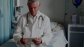 Animation of data processing over caucasian doctor. Global medicine, technology, data processing and digital interface concept digitally generated video. - Powered by Shutterstock - Get 15% off with code: PIKWIZARD15