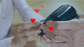 Animation of falling hearts over people using payment terminal. Global shopping, business, finances, data processing and digital interface concept digitally generated video. - Powered by Shutterstock - Get 15% off with code: PIKWIZARD15