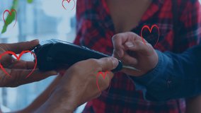 Animation of falling hearts over people using payment terminal. Global shopping, business, finances, data processing and digital interface concept digitally generated video. - Powered by Shutterstock - Get 15% off with code: PIKWIZARD15