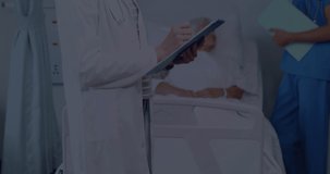 Animation of data processing over caucasian female doctor and male nurse with patient talking. Global medicine and digital interface concept digitally generated video.