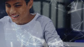 Animation of data on digital screens and connections over happy diverse teenagers with laptops. School, education and learning with technology concept digitally generated video.