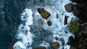 4K ProRes HQ 4:2:2 Video Aerial view high angle view Video slow motion Top-view water flowing into the water Tropical sea Andaman sea Location Phuket Thailand. 