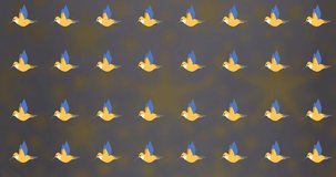 Animation of birds pattern moving over blurred stars. Colour, shape, patters and movement concept digitally generated video.