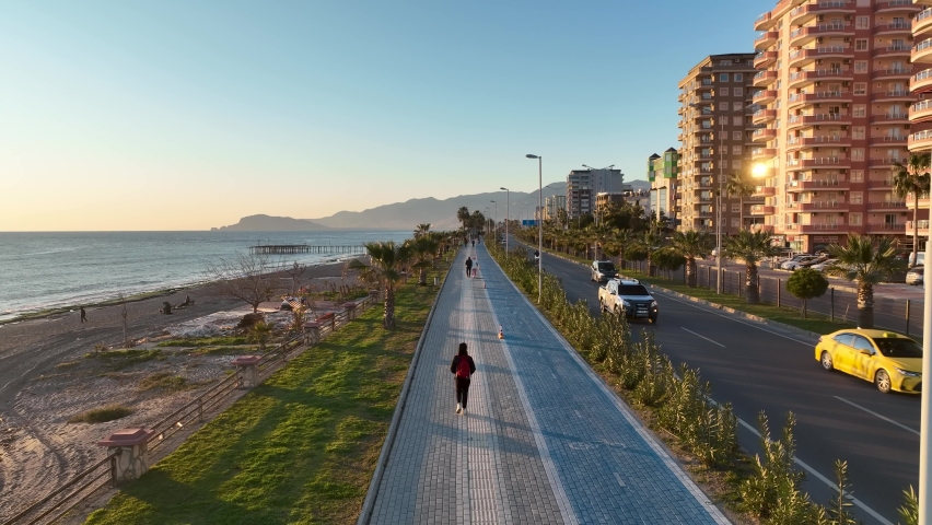 People walk around the embankment 4 K