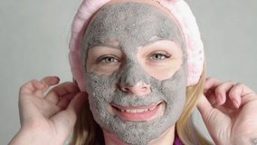 happy girl of fair appearance makes face masks at home.Close-up of a woman's face in a bubble face mask,female self-care concept,slow motion - Powered by Shutterstock - Get 15% off with code: PIKWIZARD15