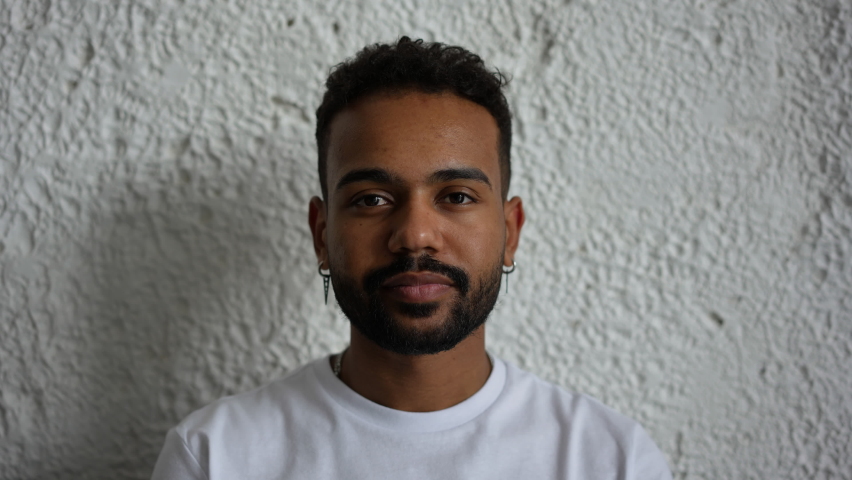 Head shot cheerful millennial 20s man portrait. Freelancer, blogger or tutor, professional occupation person smile pose looking at camera, profile picture of handsome single guy