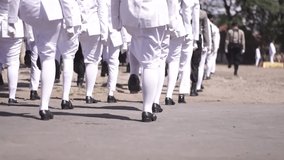 The marching group's simultaneous footsteps were walking on the field in independece day parade. - Powered by Shutterstock - Get 15% off with code: PIKWIZARD15