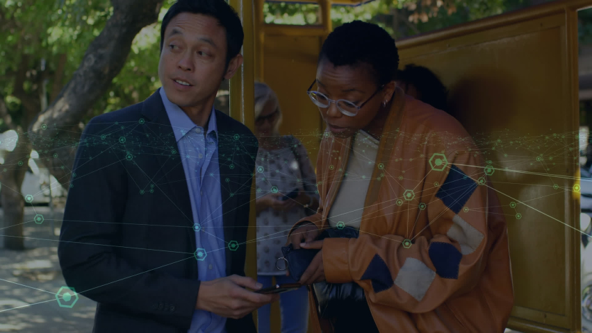 Animation of computer icons connecting with lines over diverse commuters using phones at bus stop. Digital composite, multiple exposure, passenger, waiting, telecommunications and transportation.