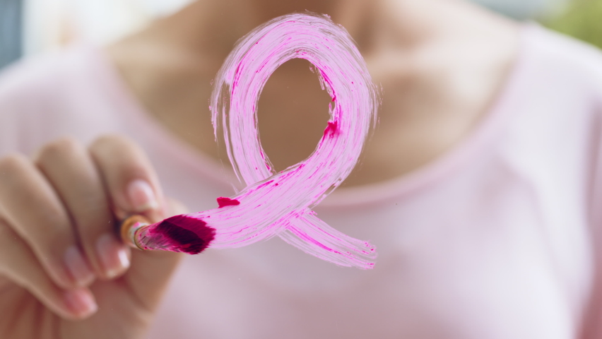 Woman draw pink ribbon sign on mirror, sign of October Breast Cancer Awareness month Royalty-Free Stock Footage #1093619237