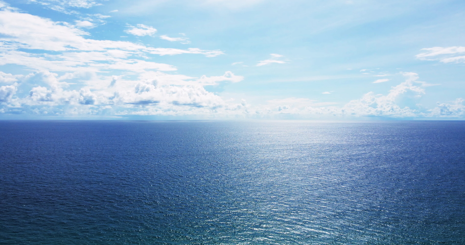 Nature video landscape Aerial view sea horizon as far as the eye can see One part sky, one part sea Nature video 4K ProRes HQ 4:2:2 Tropical sea Andaman sea. Nature and Go Everywhere travel concept. Royalty-Free Stock Footage #1093635619