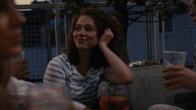 Caucasian woman spending evening together at the roof top party. Shot with RED helium camera in 8K.  - Powered by Shutterstock - Get 15% off with code: PIKWIZARD15