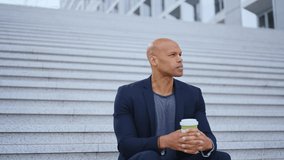 Cinematic storytelling video of a young businessman going around in the city. Successful modern sales man with suit and casual tshirt ready for an another great working day - Powered by Shutterstock - Get 15% off with code: PIKWIZARD15