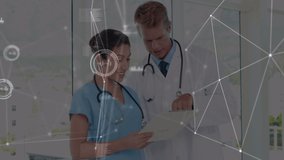 Animation of network of connections over diverse female and male doctors. Health, medicine, network, connections and technology concept digitally generated video. - Powered by Shutterstock - Get 15% off with code: PIKWIZARD15