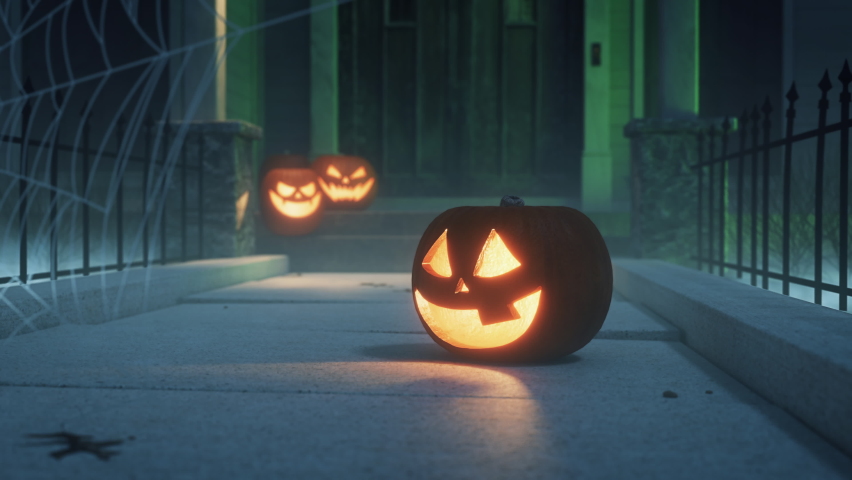 Spooky Halloween pumpkin, Jack O Lantern with Jack Skeletron from the movie  The Nightmare Before Christmas, with pumpkins lights hanging from a window  during a party Stock Photo