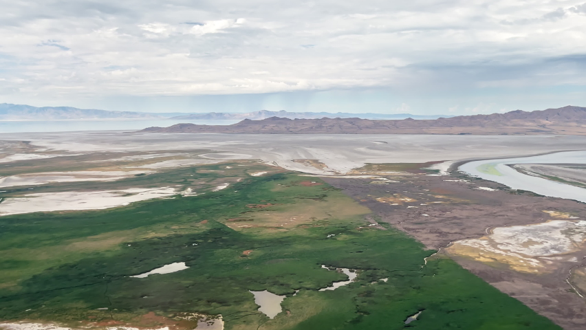 Flying over Farmington Bay looking towards Antelope Island during record drought on the Great Salt Lake in Utah.