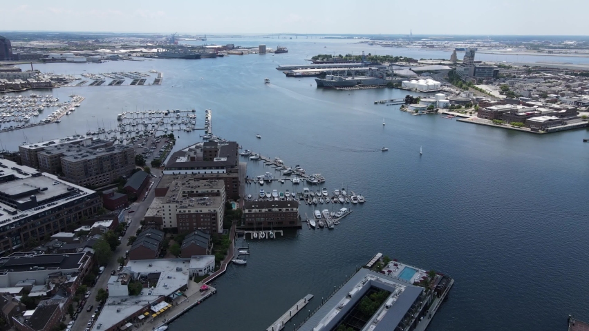 Aerial view of harbor area. Yachts, ships sailboats, coast, scenic view of water, resort, lodging by the bay,  Water as far as the eye can see.
