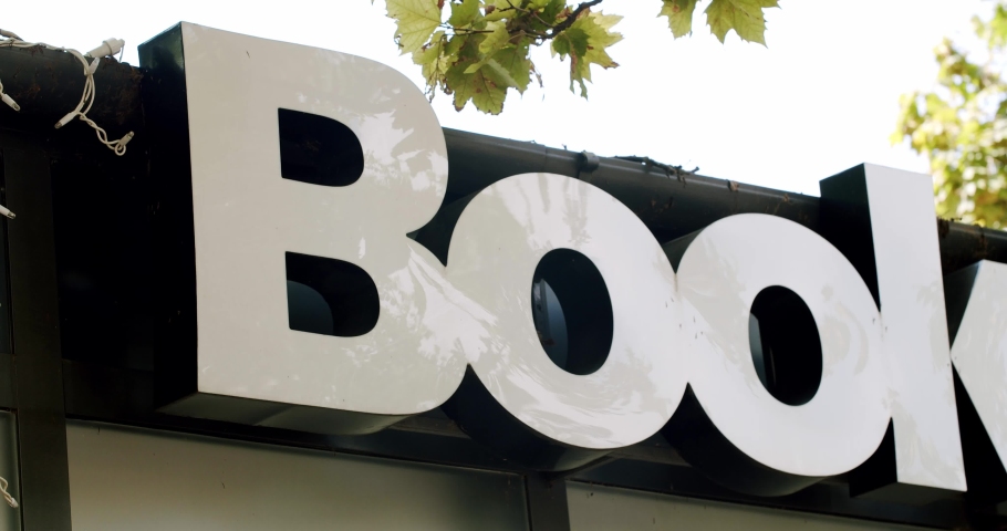 Sign with modern letters outside book store. book store inscription ,Book Concept. text on market place.