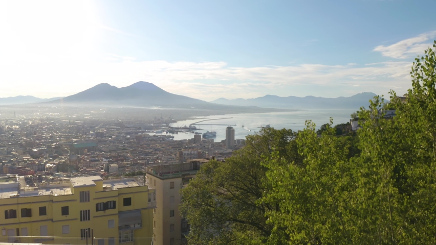 Aerial Boom Shot Reveals Naples, Italy with Mount Vesuvius in Background. Napoli, Campania Royalty-Free Stock Footage #1093672157